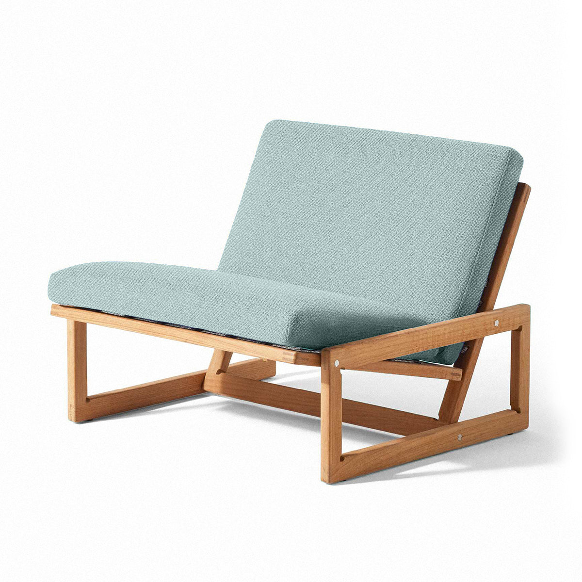 Carlotta original design reference — front view with loose cushions; not a photograph of Gulmohar's custom teak version.