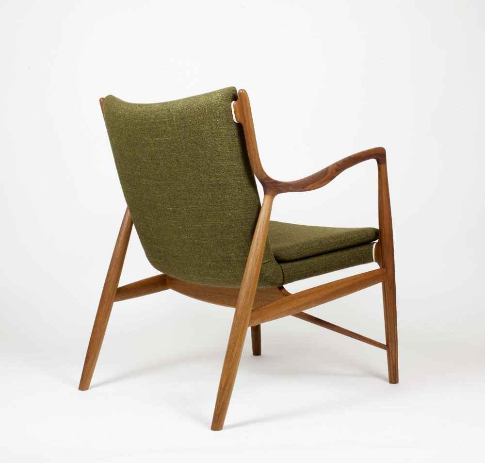 Finn Juhl 45 Chair with a teak wood frame and olive green upholstered seat and back.