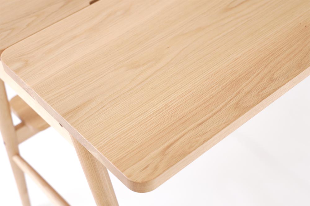 Theta Desk: Tabletop detail; original design reference, not Gulmohar teak finish