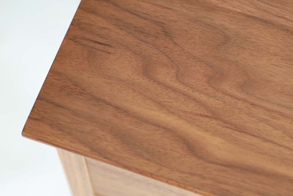 Flag Desk two drawers: Tabletop detail; original design reference, not Gulmohar teak finish