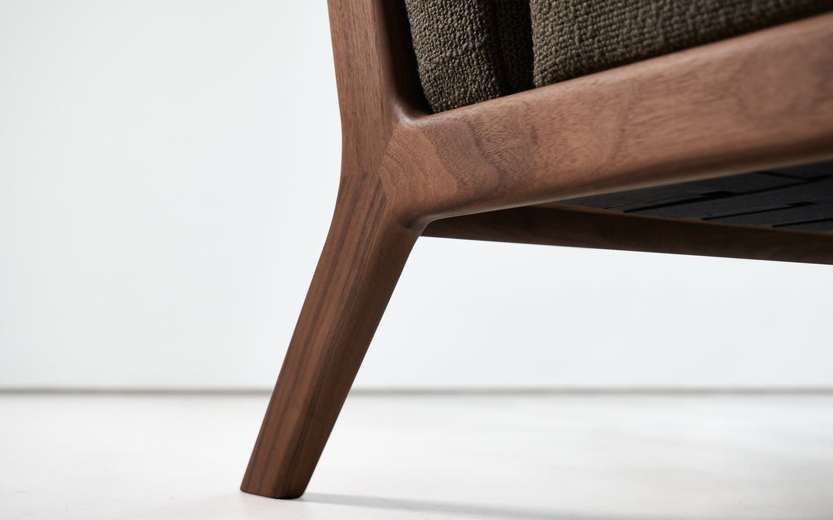 SOVA chaise longue curved timber leg and seat rail detail; original walnut design reference
