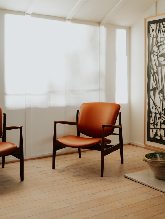 France Lounge Chair three-quarter room view with cognac leather; original walnut design reference