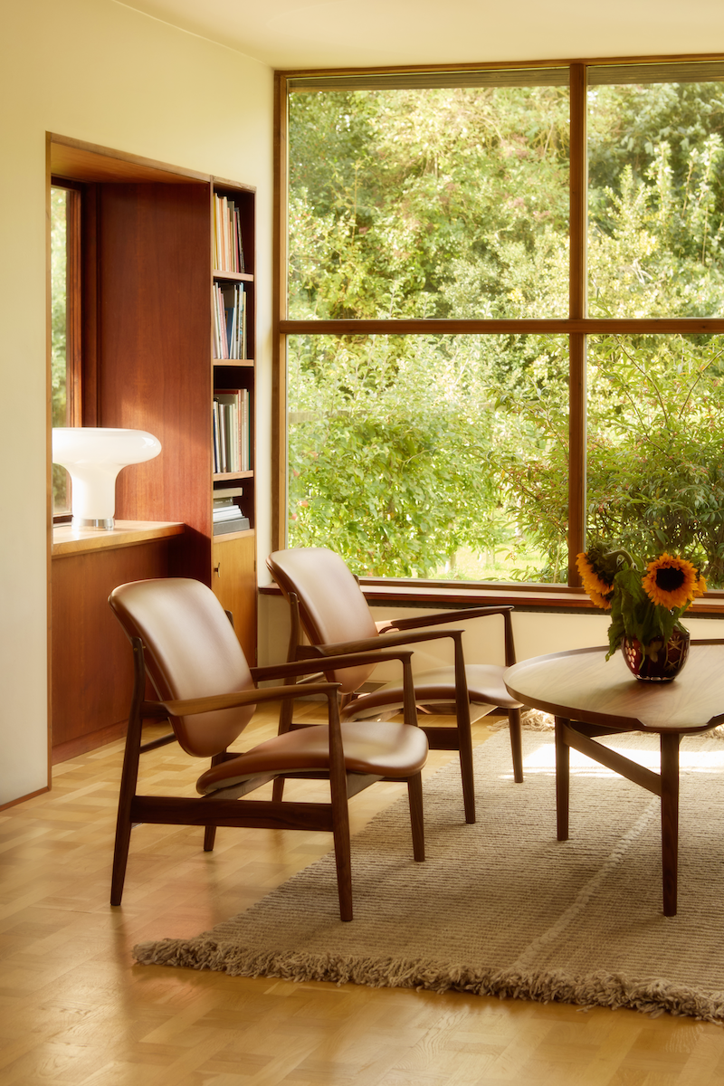 France Lounge Chair lifestyle view of the open frame; original walnut design reference