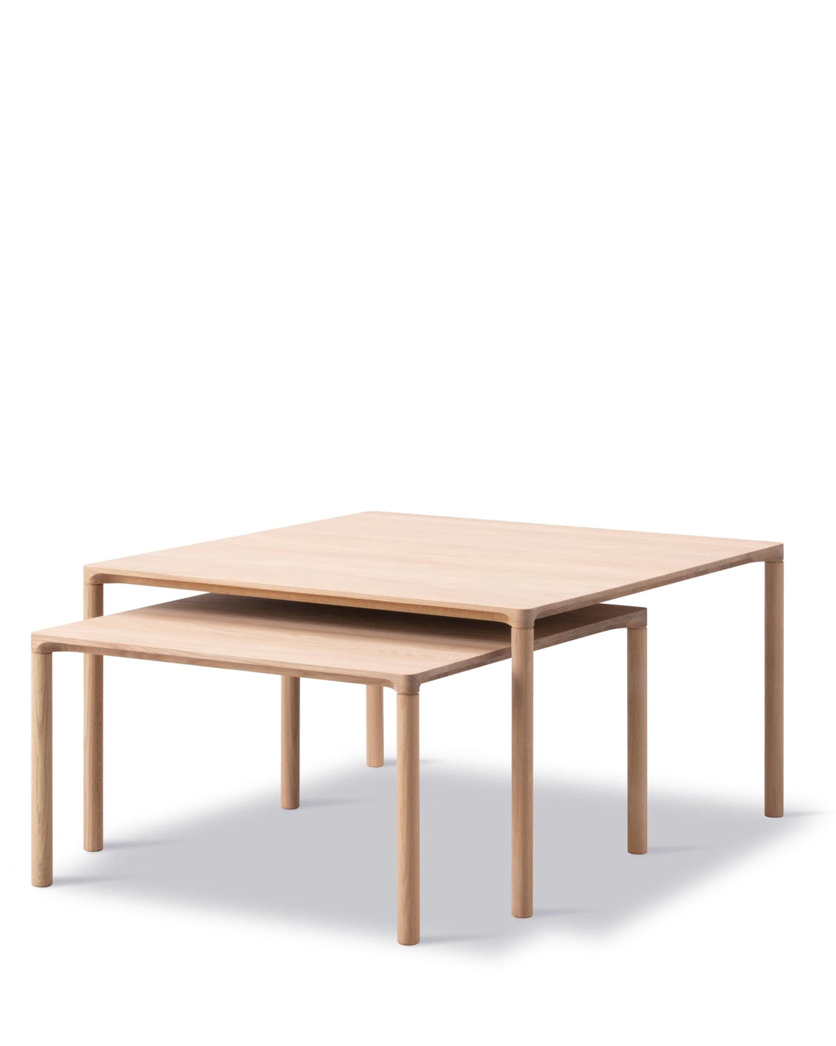 Piloti 6720 shown with a smaller companion table — original Fredericia design reference, angled view; companion table not included