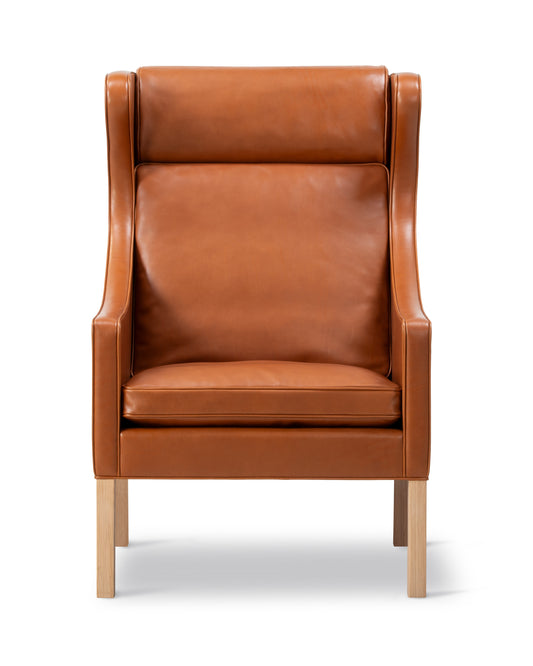 Mogensen 2204 Wing Chair, reference view 1. Fredericia design photograph; Gulmohar wooden components made in teak.