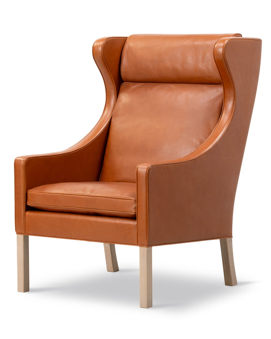 Mogensen 2204 Wing Chair, reference view 2. Fredericia design photograph; Gulmohar wooden components made in teak.