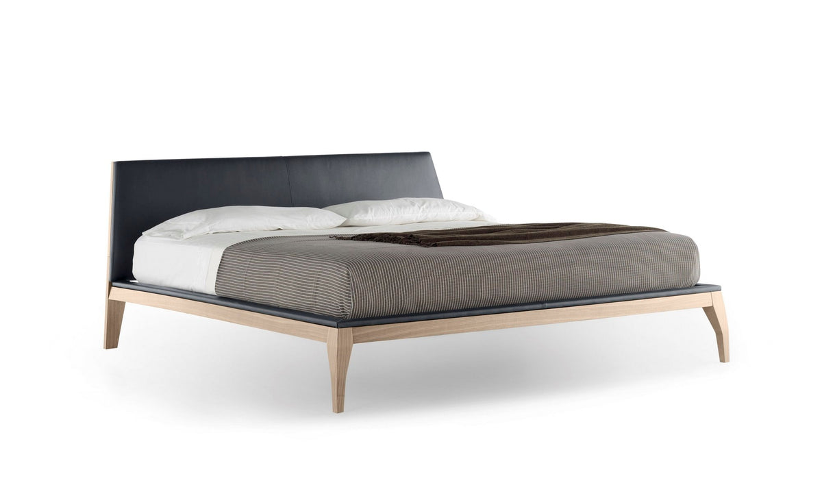 Bel style bed, view 1; design reference for a custom teak bed by Gulmohar Wood Works, Bangalore. Fabric shown is not final.