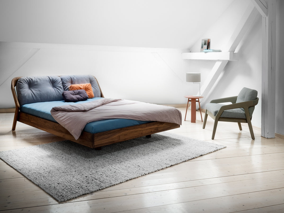 Friday Night style bed, view 2; design reference for a custom teak bed by Gulmohar Wood Works, Bangalore. Fabric shown is not final.
