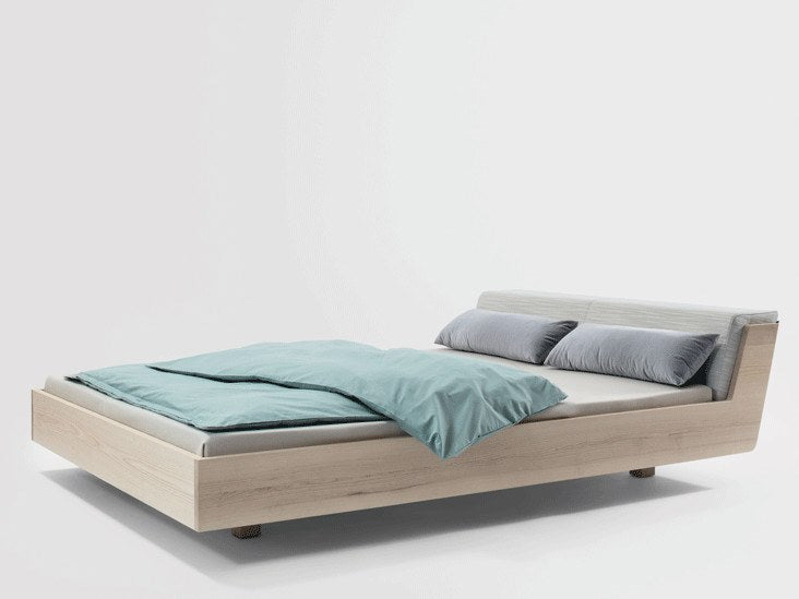 Fusion style bed, view 1; design reference for a custom teak bed by Gulmohar Wood Works, Bangalore. Fabric shown is not final.