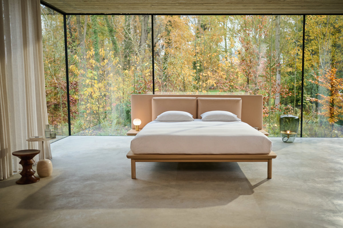 Noble style bed, view 2; teak interpretation crafted by Gulmohar Wood Works in Bangalore. Fabric shown is a design reference.