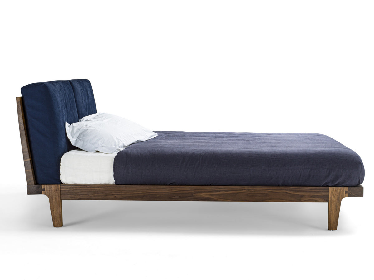 Revo Bed Soft style bed, view 1; design reference for a custom teak bed by Gulmohar Wood Works, Bangalore. Fabric shown is not final.