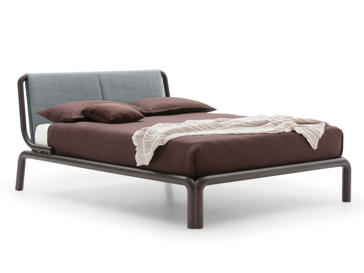 Rovi style bed, view 1; design reference for a custom teak bed by Gulmohar Wood Works, Bangalore. Fabric shown is not final.