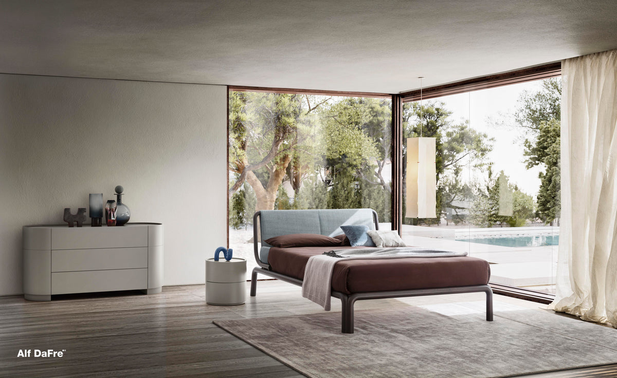 Rovi style bed, view 2; design reference for a custom teak bed by Gulmohar Wood Works, Bangalore. Fabric shown is not final.