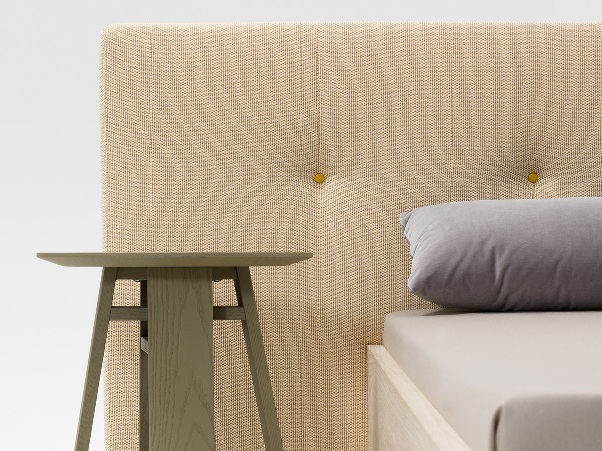 Simple Button style bed, view 2; design reference for a custom teak bed by Gulmohar Wood Works, Bangalore. Fabric shown is not final.