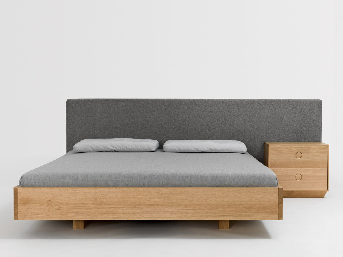 Simple Comfort style bed, view 1; design reference for a custom teak bed by Gulmohar Wood Works, Bangalore. Fabric shown is not final.