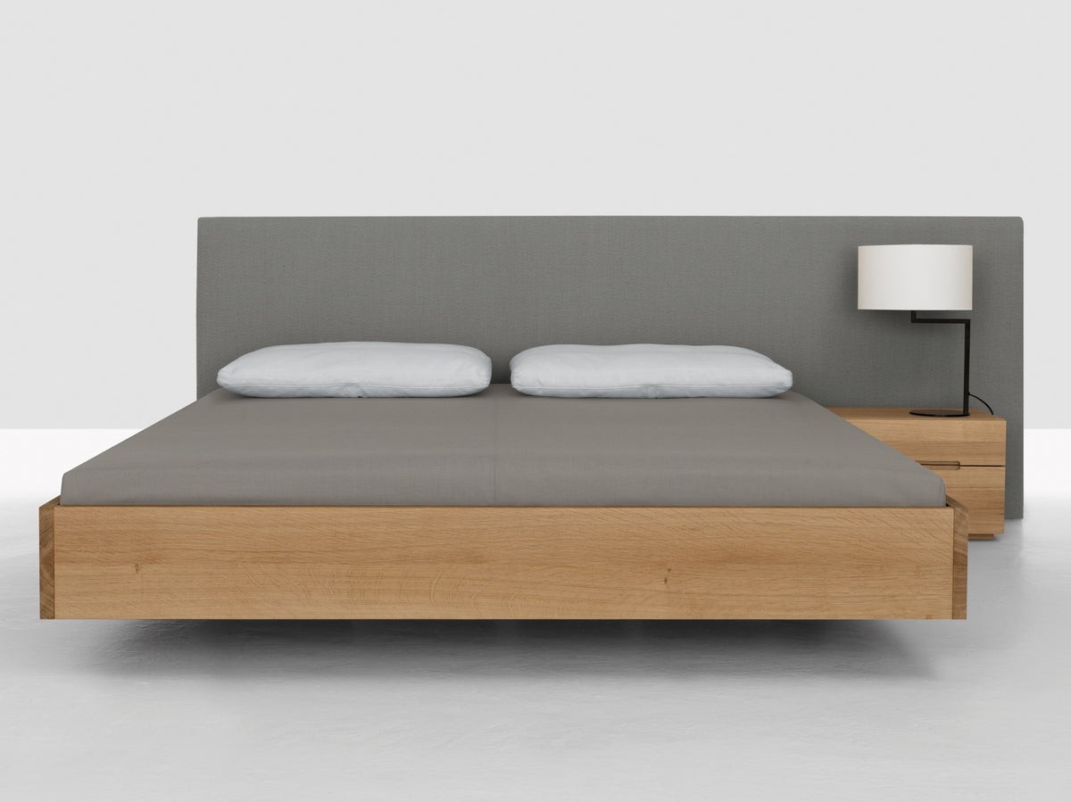 Simple Comfort style bed, view 2; design reference for a custom teak bed by Gulmohar Wood Works, Bangalore. Fabric shown is not final.