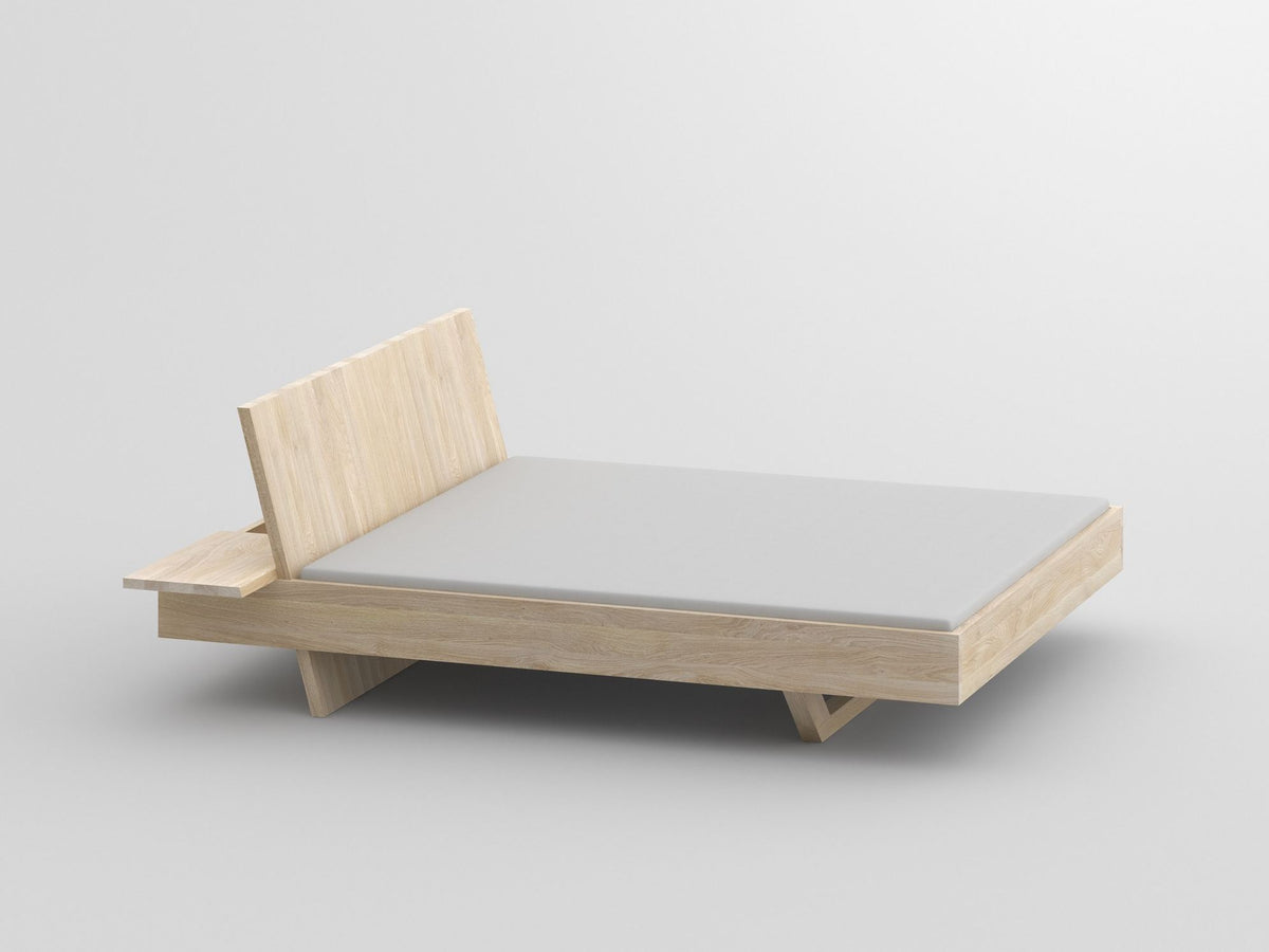 Somnia style bed, view 1; design reference for a custom teak bed by Gulmohar Wood Works, Bangalore. Fabric shown is not final.