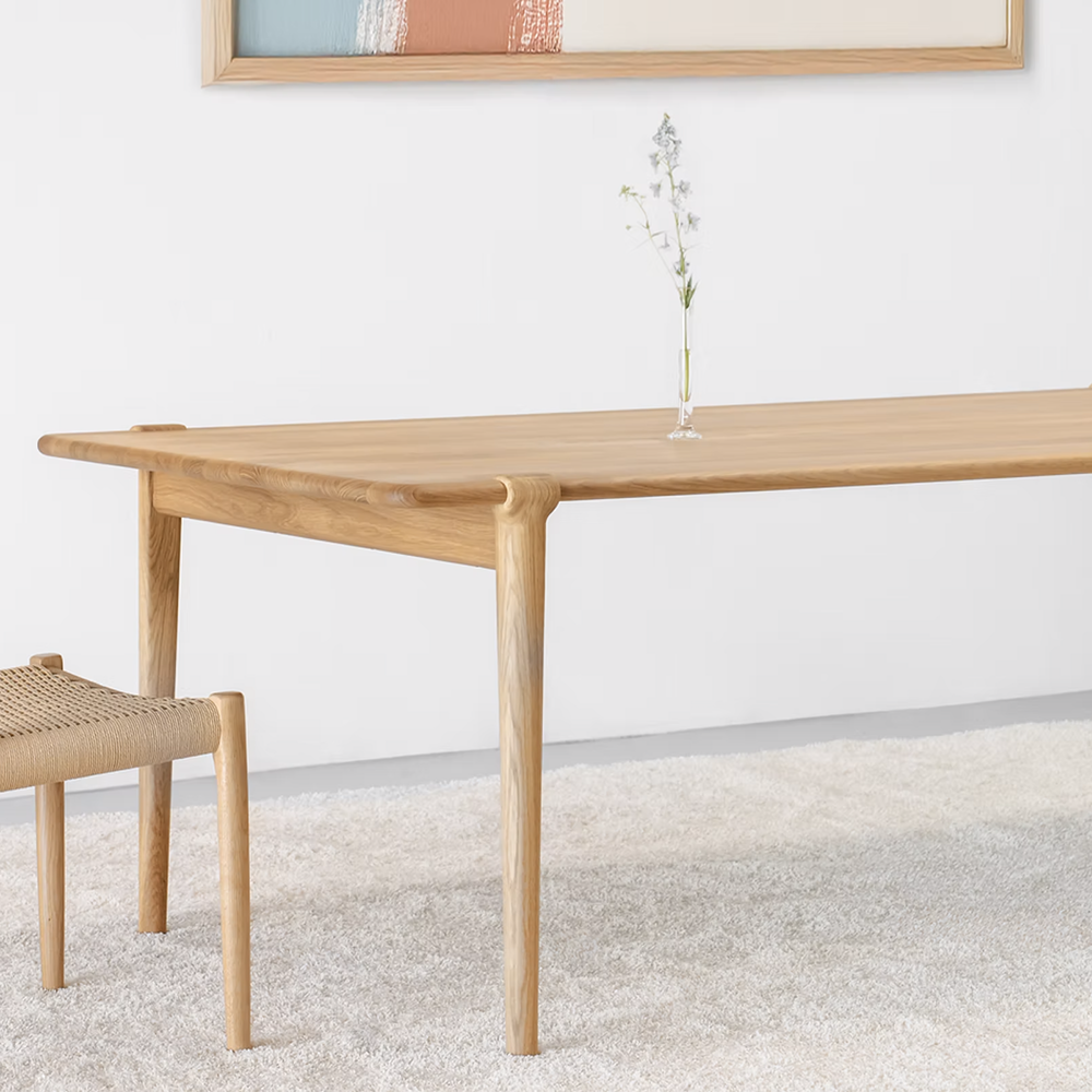 Original J.L. Møller Model 14 design reference — tabletop and leg detail. Source: BLU KAT. Custom Gulmohar teak version may differ.