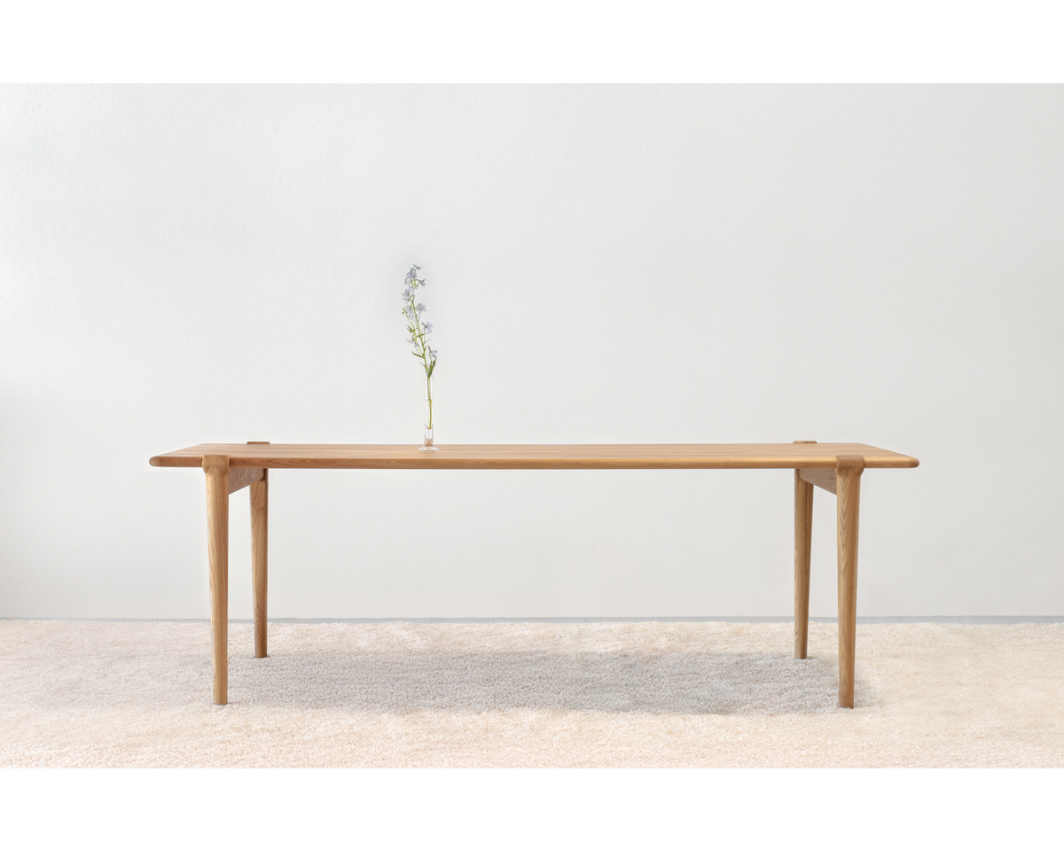 J.L. Møller Model 14 original design reference; Gulmohar's custom version uses teak