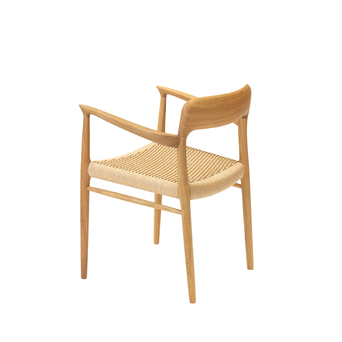 Original J.L. Møller Model 56 design reference — rear three-quarter view. Source: J.L. Møller. Custom Gulmohar teak version may differ.