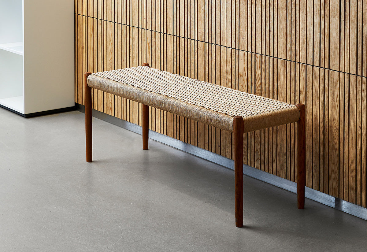 Original J.L. Møller Model 63A design reference — interior setting. Source: twentytwentyone. Custom Gulmohar teak version may differ.