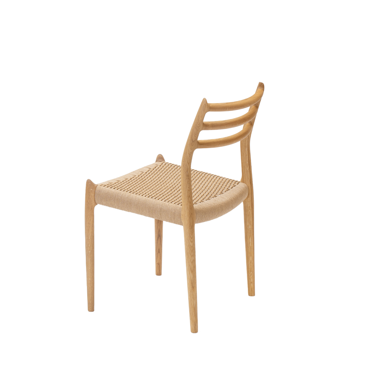 Original J.L. Møller Model 78 design reference — rear three-quarter view. Source: J.L. Møller. Custom Gulmohar teak version may differ.