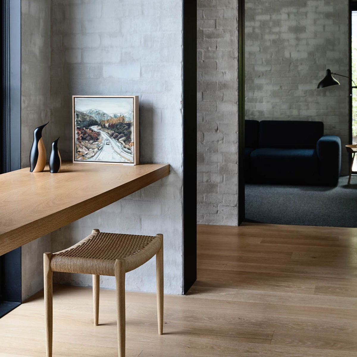 Original J.L. Møller Model 80A design reference — interior setting. Source: BLU KAT. Custom Gulmohar teak version may differ.