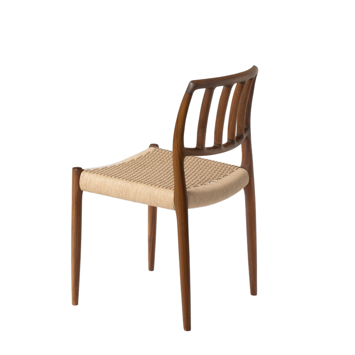 Original J.L. Møller Model 83 design reference — rear three-quarter view. Source: J.L. Møller. Custom Gulmohar teak version may differ.