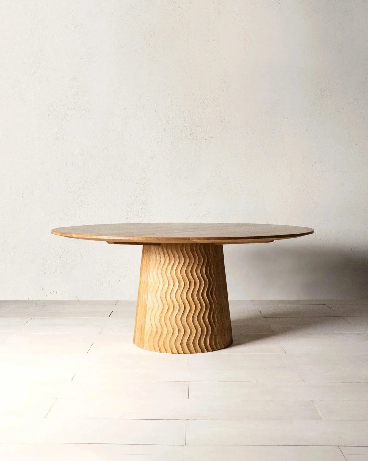 Aurora Dining Table by Mythology, overall view in English oak; design reference, not the finished Gulmohar teak version.