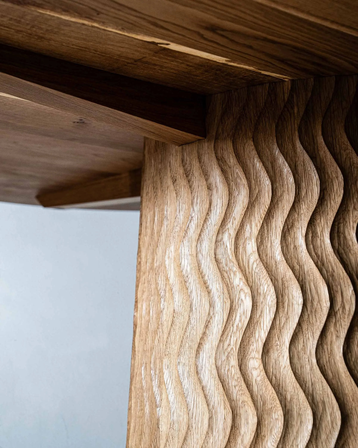 Aurora Dining Table by Mythology, alternate view in English oak; design reference, not the finished Gulmohar teak version.