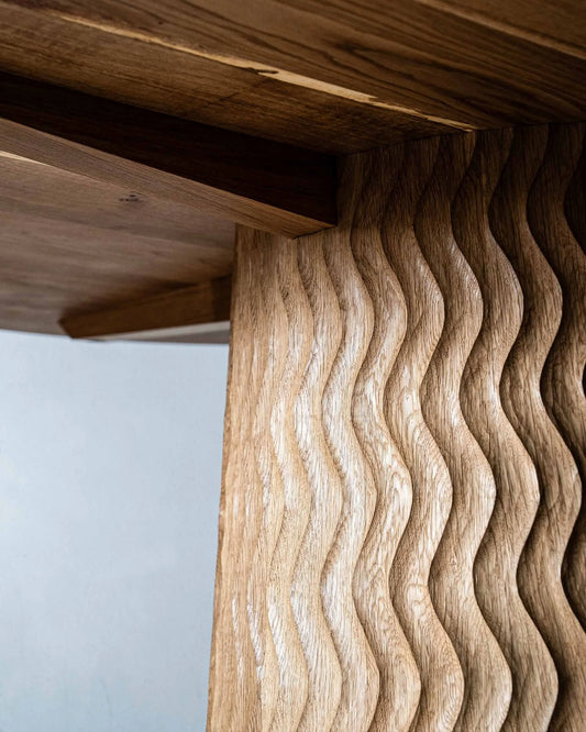 Aurora Dining Table by Mythology, alternate view in English oak; design reference, not the finished Gulmohar teak version.