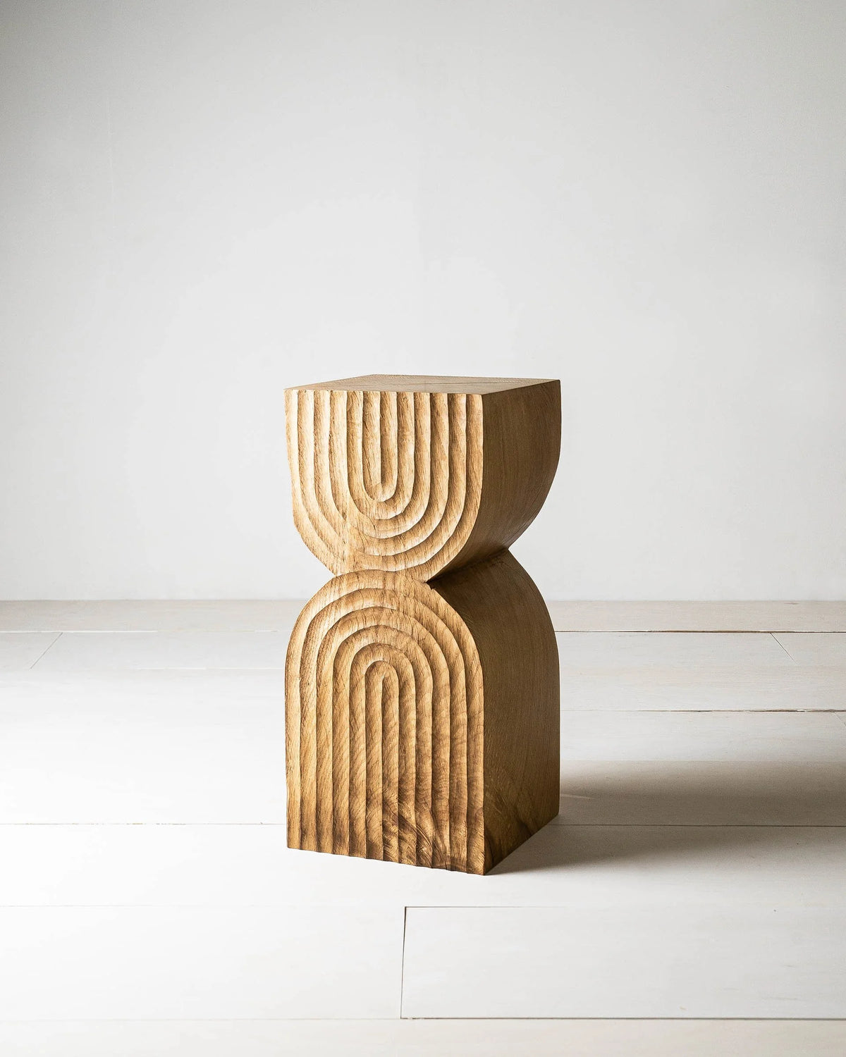 Aya Side Table by Mythology, overall view in reclaimed oak; design reference, not the finished Gulmohar teak version.