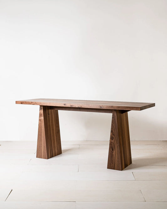 Odin Desk by Mythology, overall view in walnut; design reference, not the finished Gulmohar teak version.