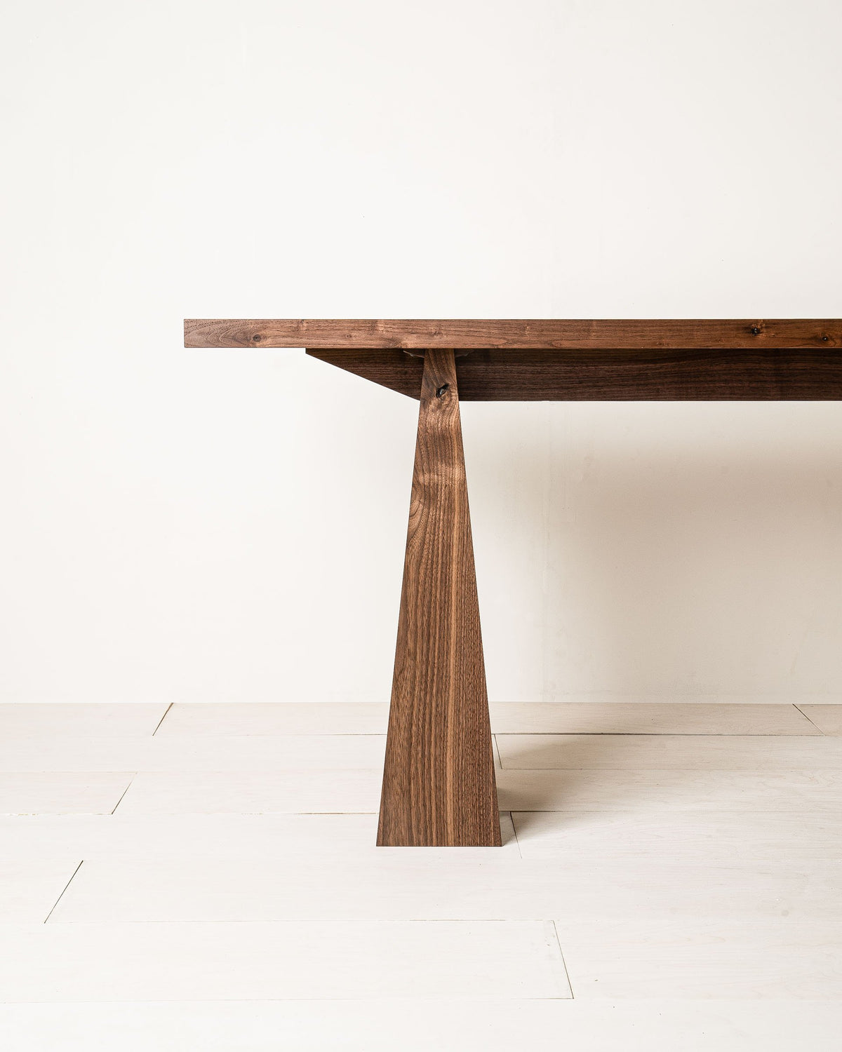 Odin Desk by Mythology, alternate view in walnut; design reference, not the finished Gulmohar teak version.