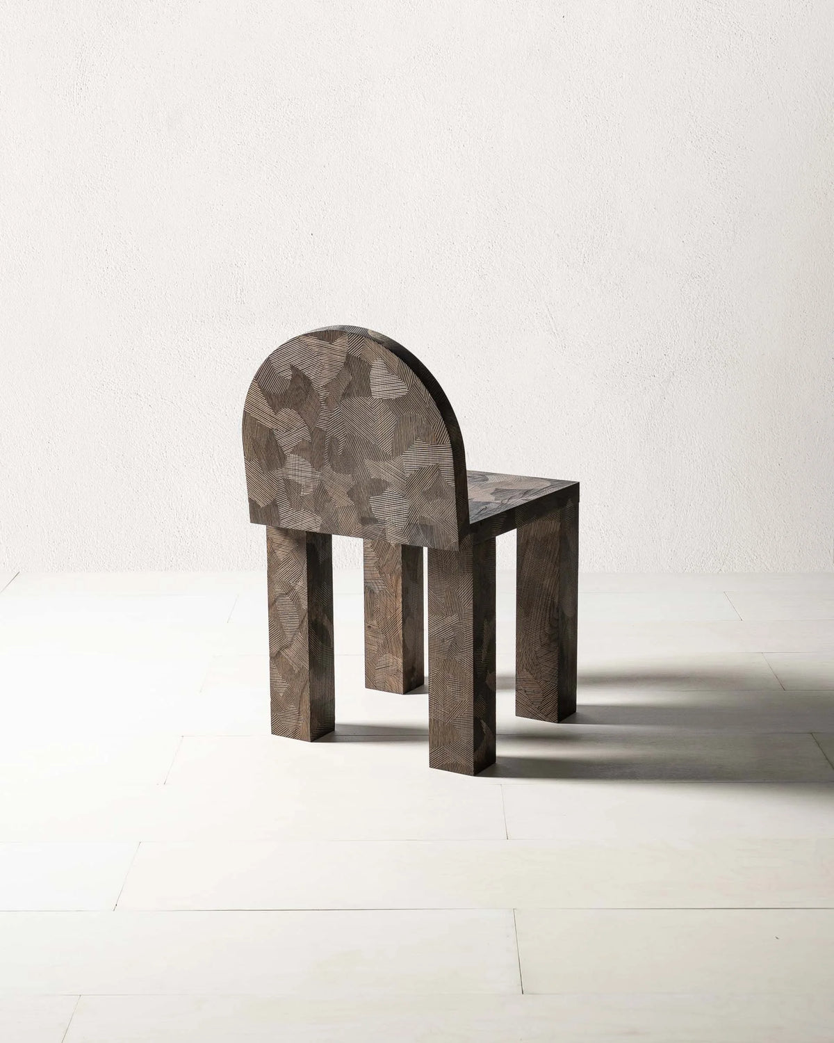 Sirona Chair by Mythology, alternate view in English elm; design reference, not the finished Gulmohar teak version.