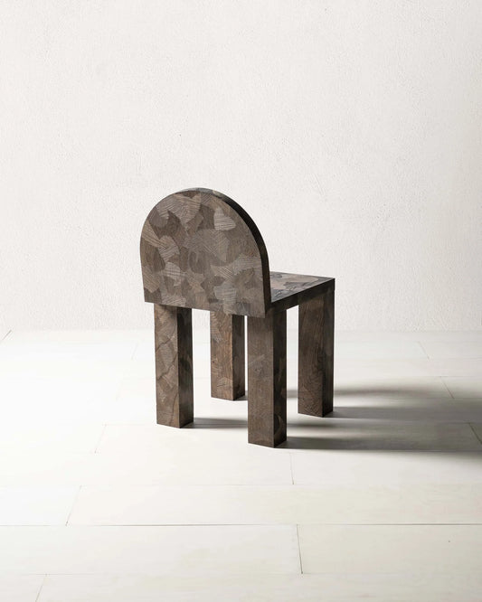 Sirona Chair by Mythology, alternate view in English elm; design reference, not the finished Gulmohar teak version.