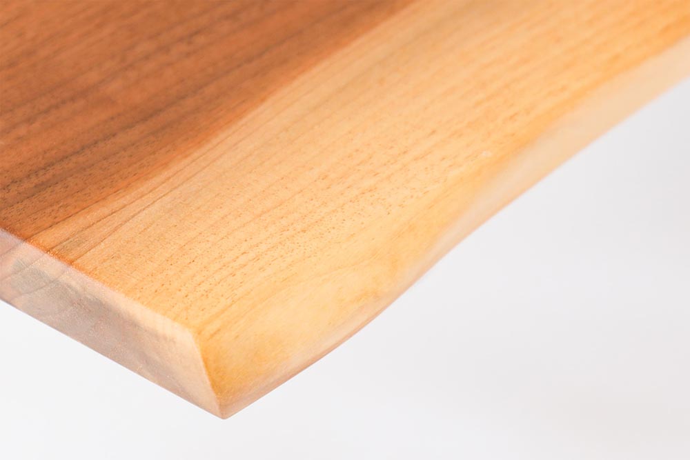 Premium Desk: Tabletop corner; original design reference, not Gulmohar teak finish