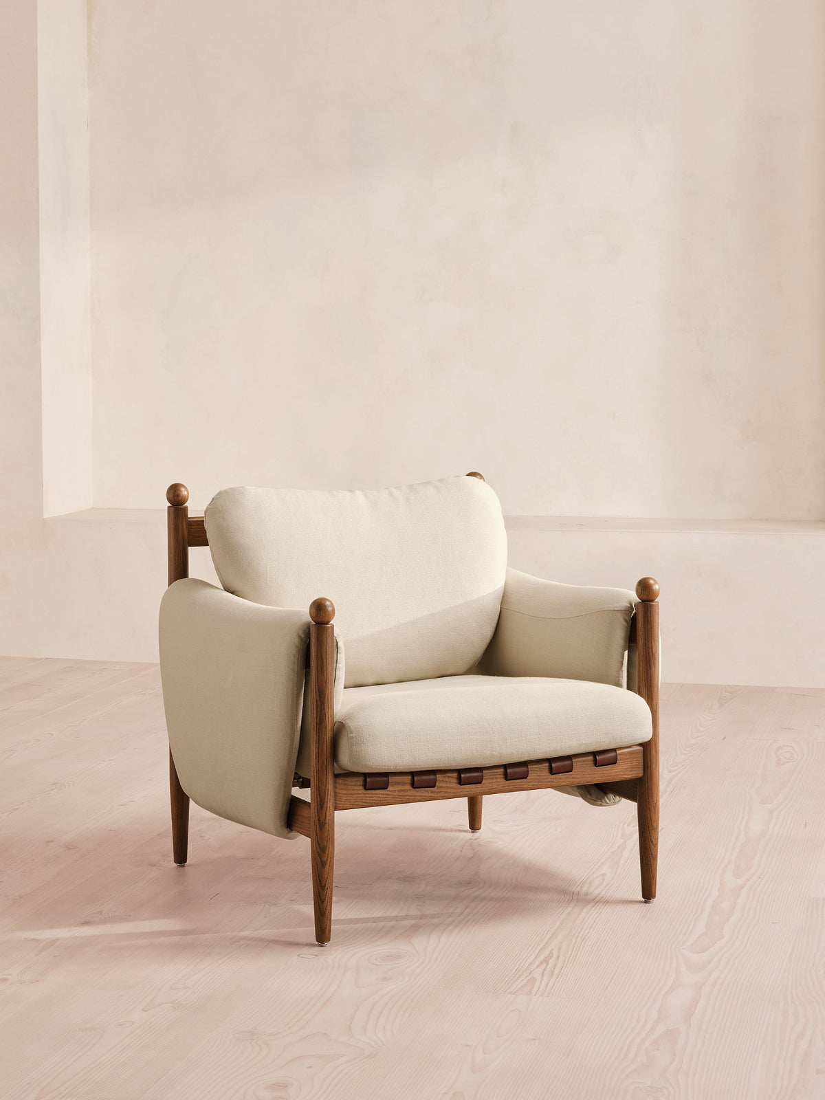 Soho Home Casper Armchair, front three-quarter view. Original design reference; Gulmohar custom version uses teak.