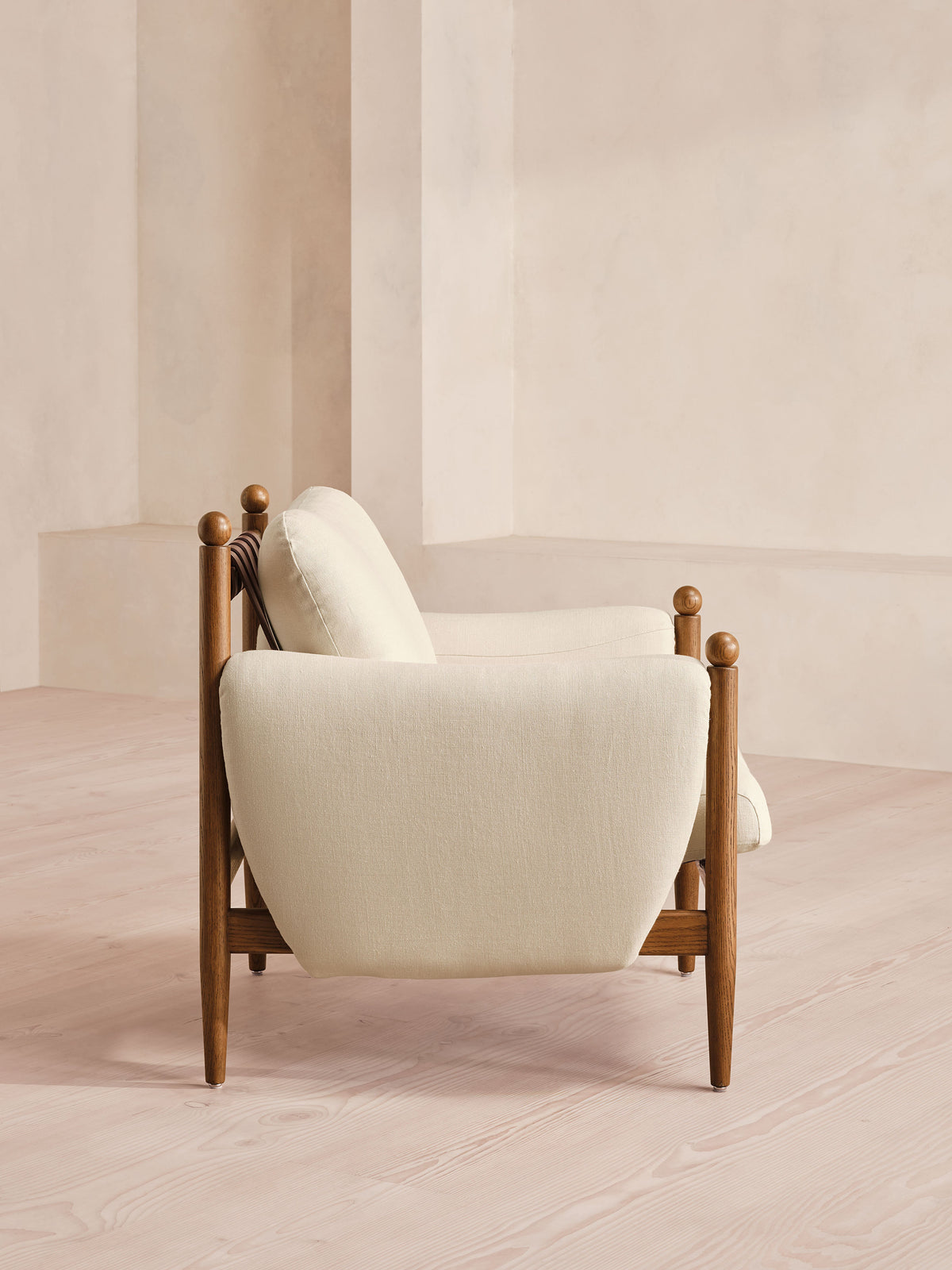 Soho Home Casper Armchair, side view. Original design reference; Gulmohar custom version uses teak.