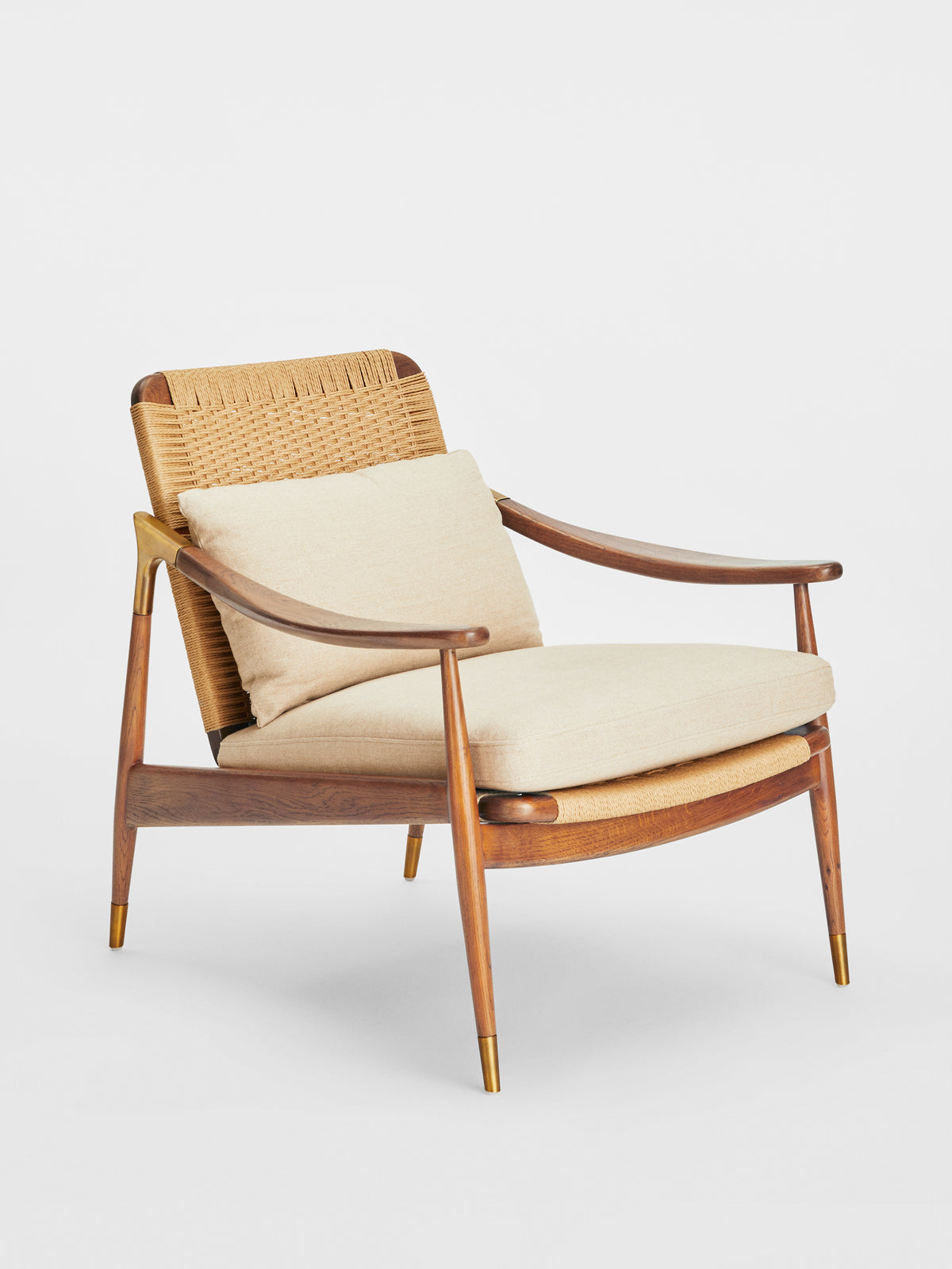 Soho Home Jonas Armchair, front three-quarter view. Original design reference; Gulmohar custom version uses teak.