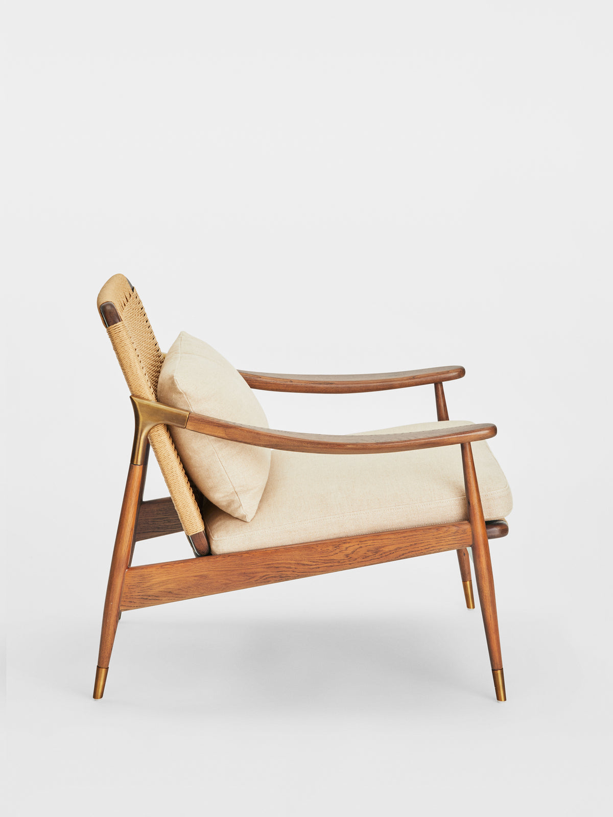 Soho Home Jonas Armchair, side view. Original design reference; Gulmohar custom version uses teak.