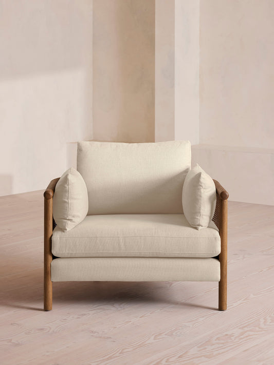 Soho Home Sydney Cane Armchair, front view. Original design reference; Gulmohar custom version uses teak.