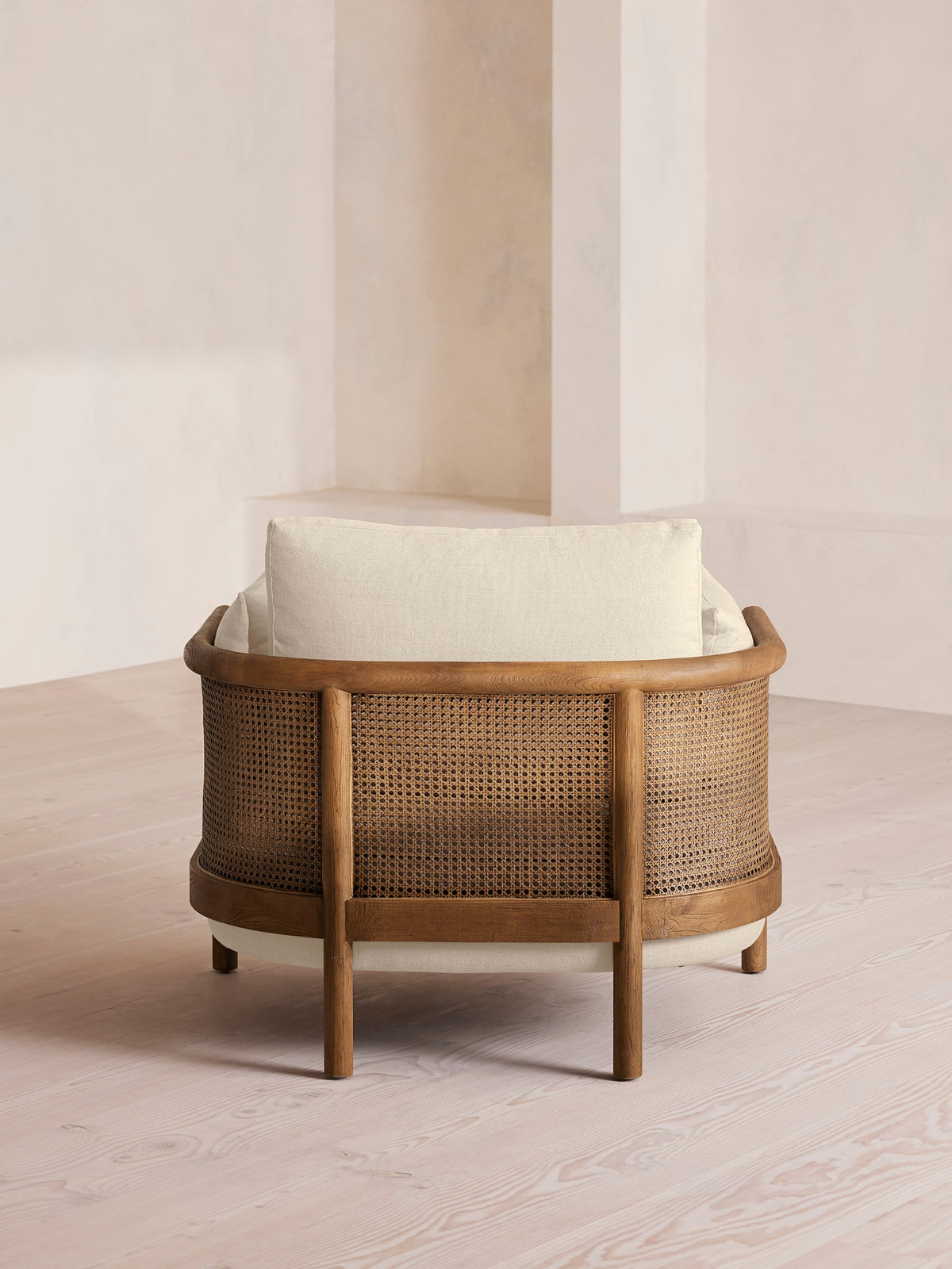 Soho Home Sydney Cane Armchair, rear view. Original design reference; Gulmohar custom version uses teak.