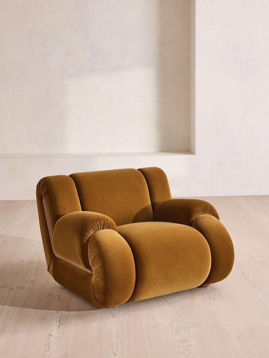 Soho Home Umbria Armchair, front three-quarter view. Original design reference; Gulmohar custom version uses teak.