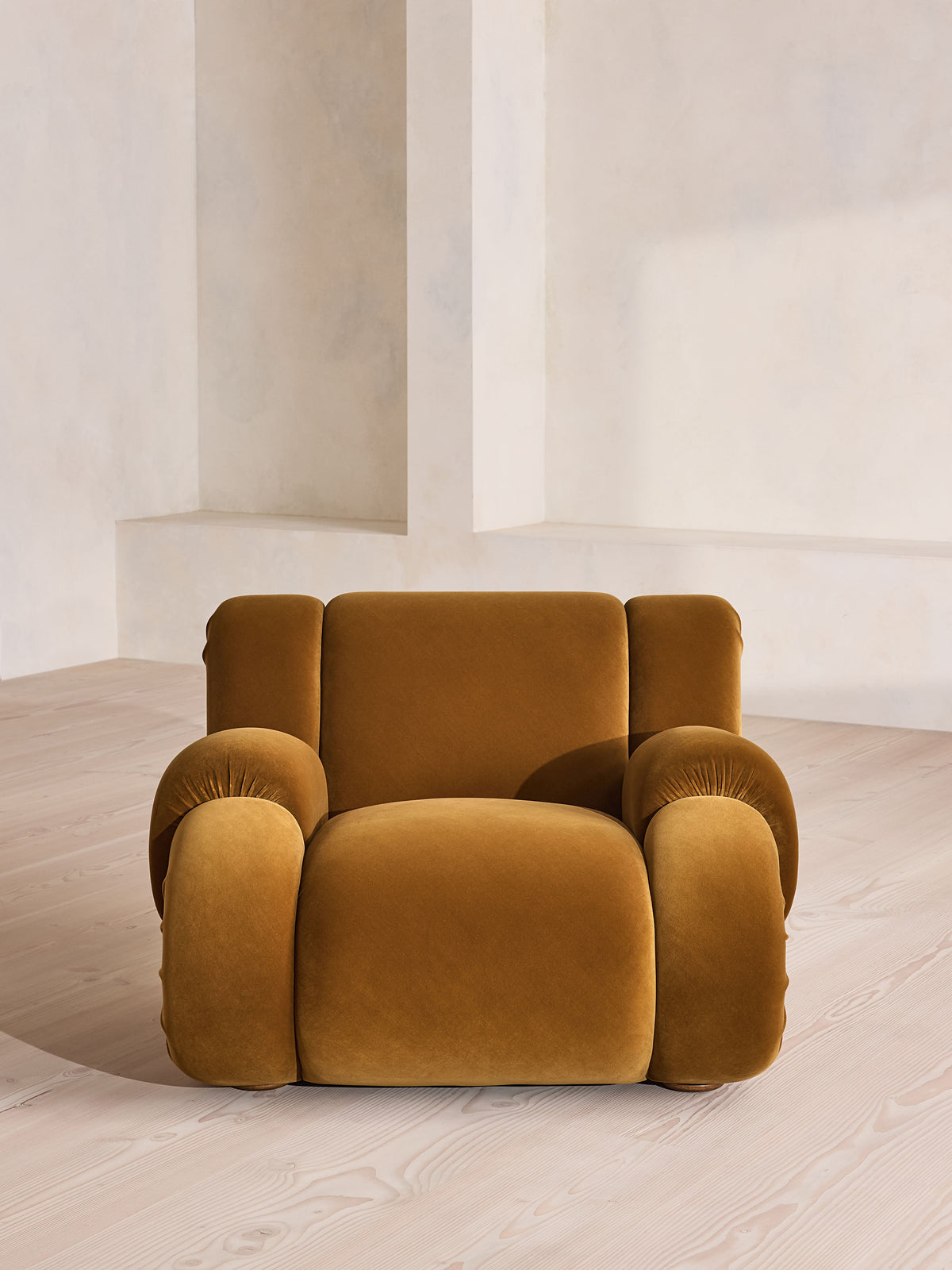 Soho Home Umbria Armchair, front view. Original design reference; Gulmohar custom version uses teak.