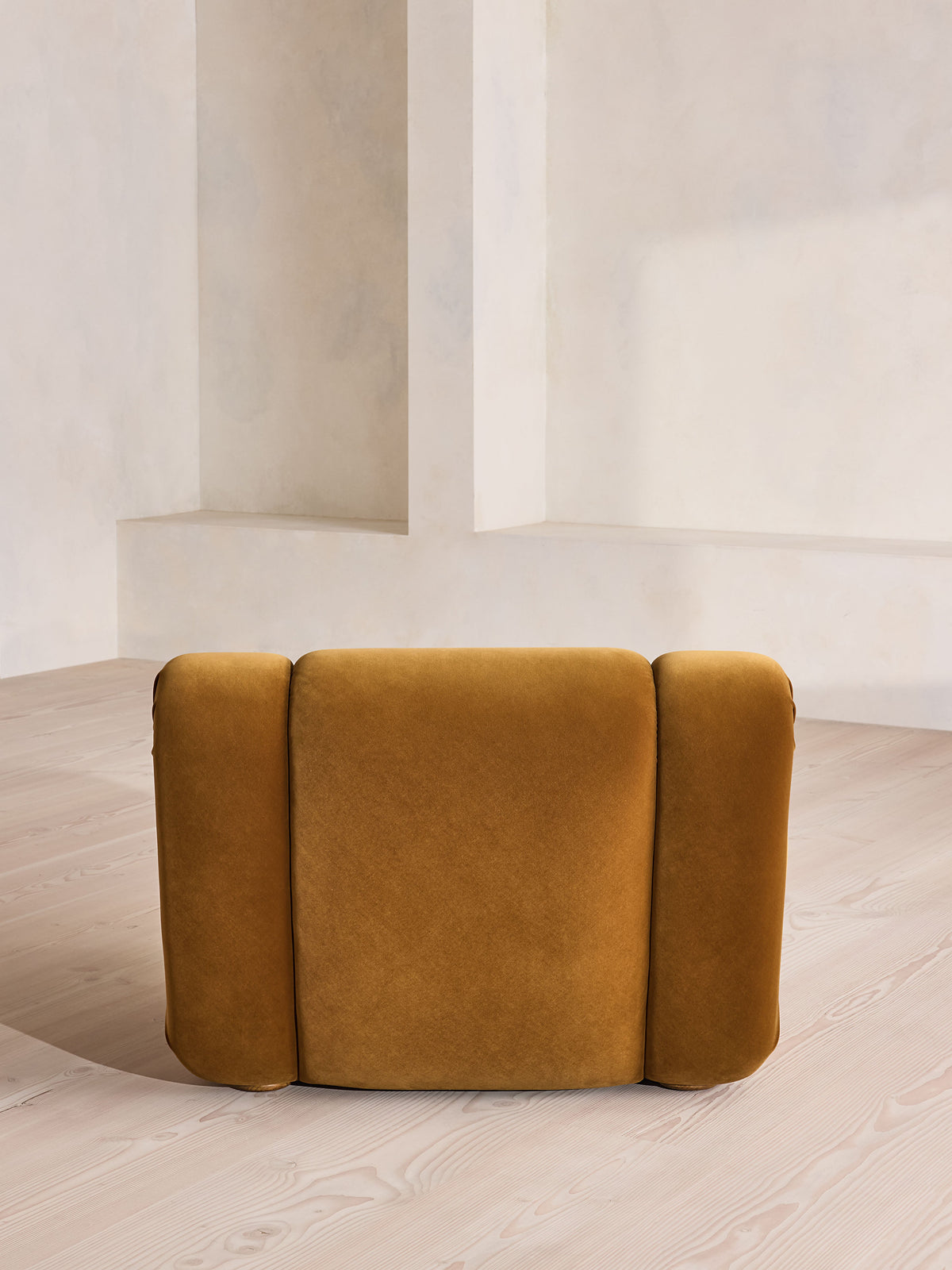 Soho Home Umbria Armchair, rear view. Original design reference; Gulmohar custom version uses teak.