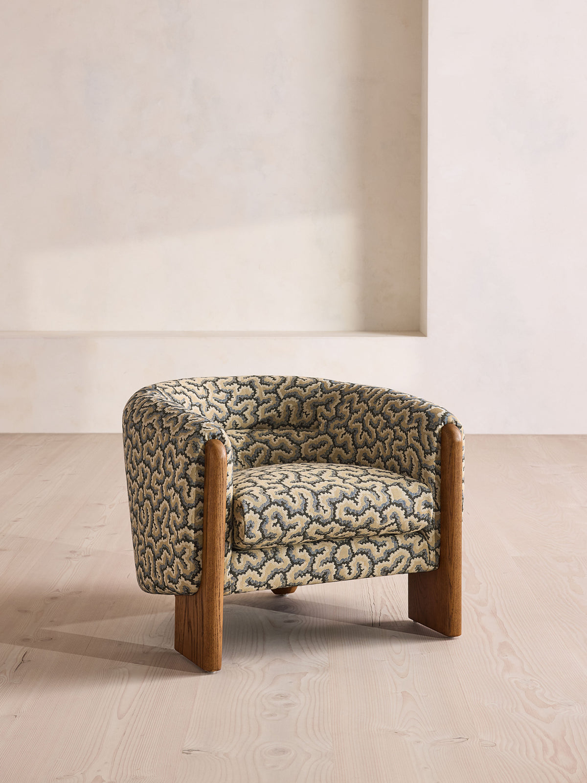 Soho Home Winnie Armchair, front three-quarter view. Original design reference; Gulmohar custom version uses teak.