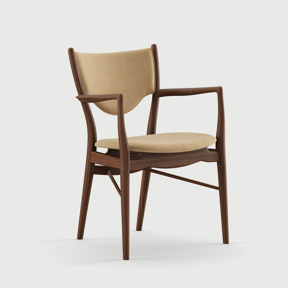 46 Dining Armchair three-quarter view with fabric seat and back; original walnut design reference