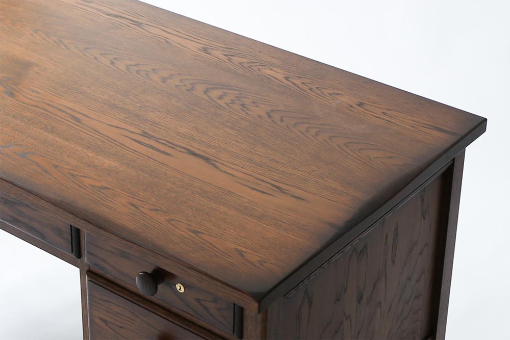 Castellia desk: Tabletop detail; original design reference, not Gulmohar teak finish