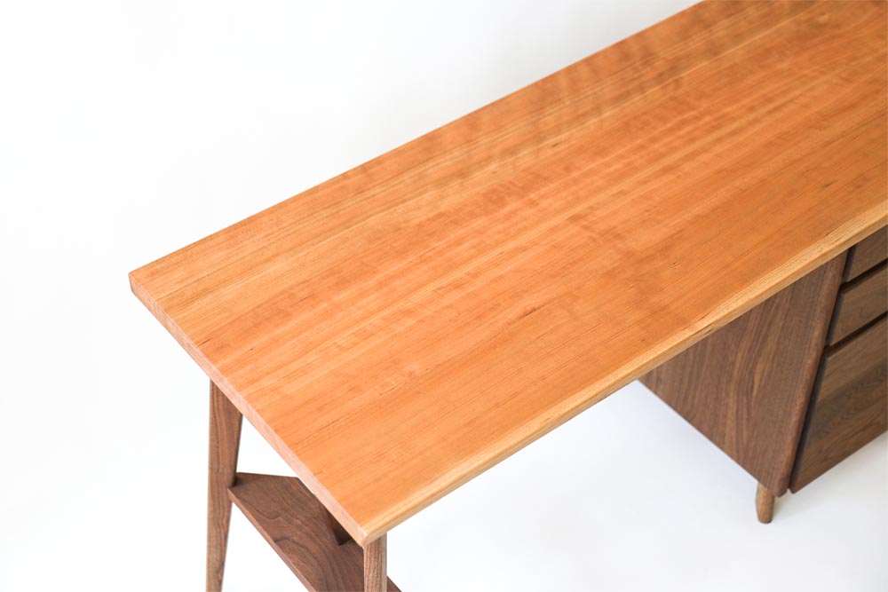 Solid Desk: Tabletop detail; original design reference, not Gulmohar teak finish